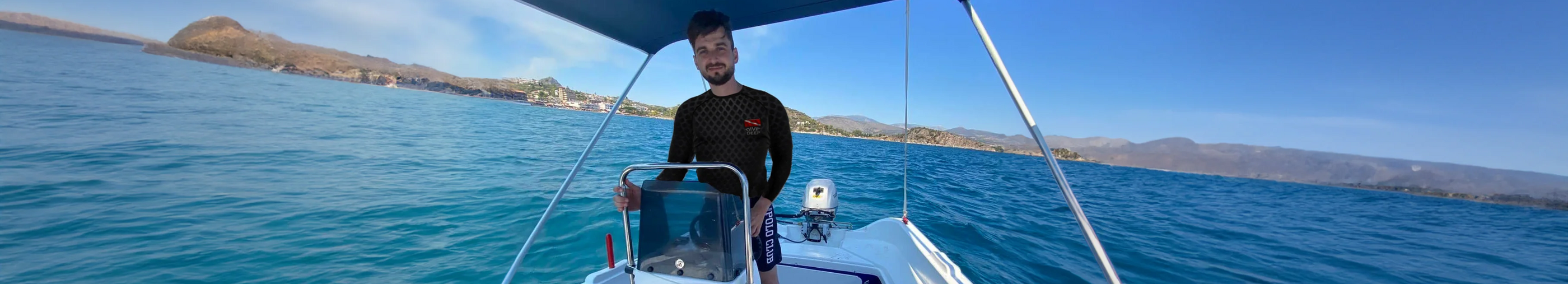 Diver Bubbles founder on the boat off the coast of Greece